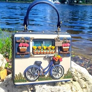 Mary frances ride on bicycle crossbody bag